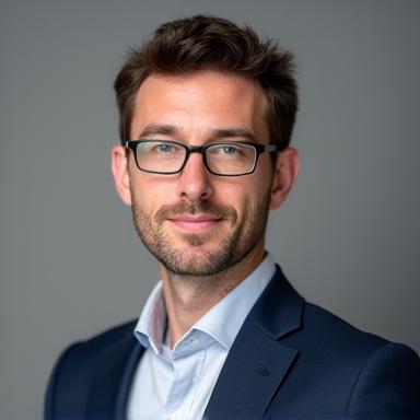 Professional headshot of Dr. Alistair Finch.